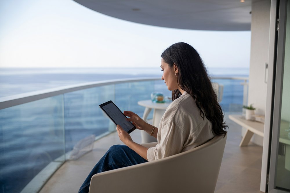 The screen reflects only the ocean, the perfect backdrop for meaningful work without professional pretense.